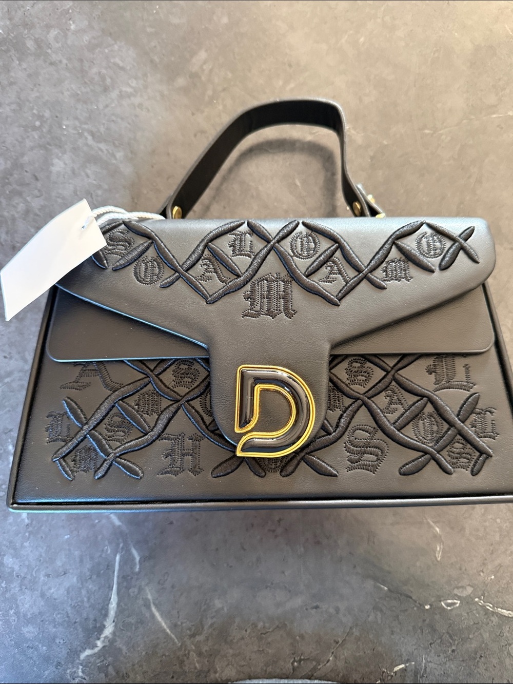 Black Quilted 'D' Accent Top-Handle Bag